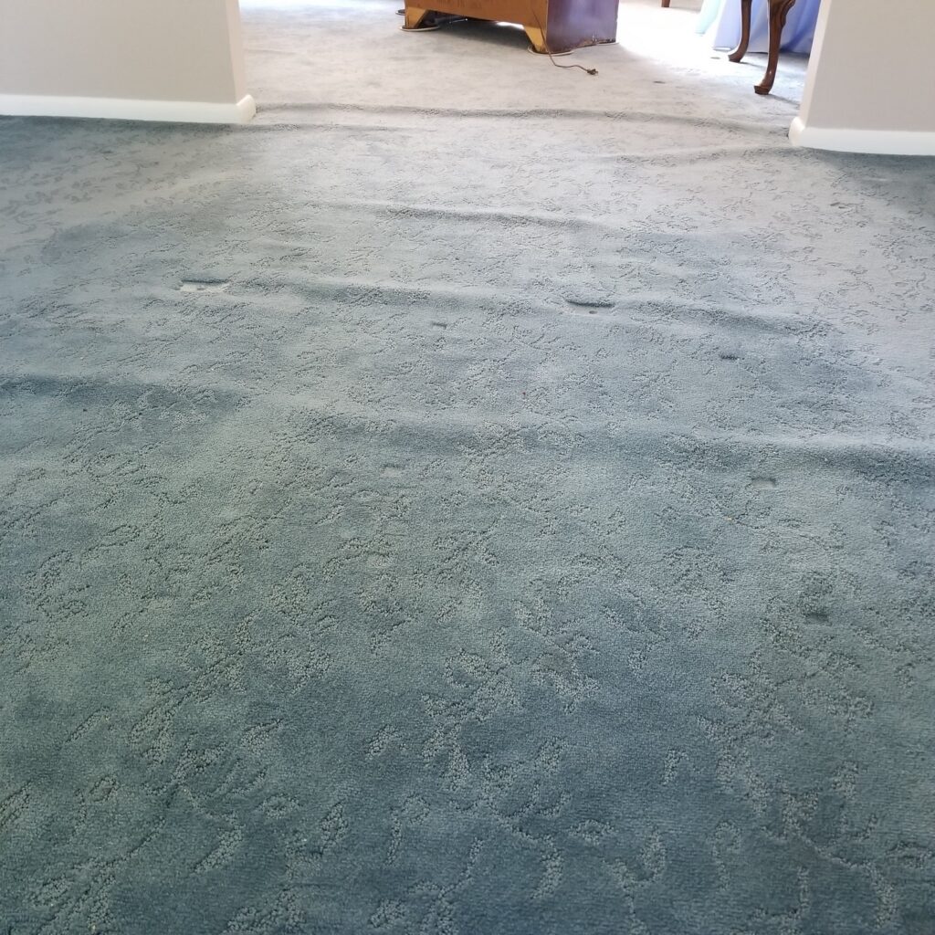 Carpet stretching and repair in Furlong bumpy carpet before Five Star Carpet Service get involved and performed carpet stretching